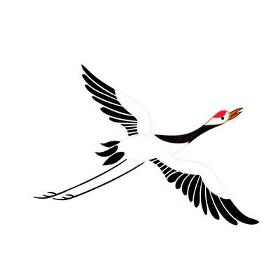 A white crane with a red crown in flight.